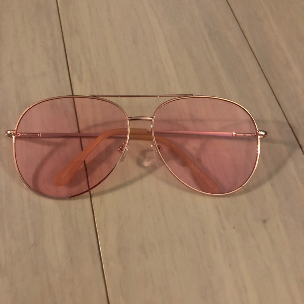 Pink tinted sunglasses